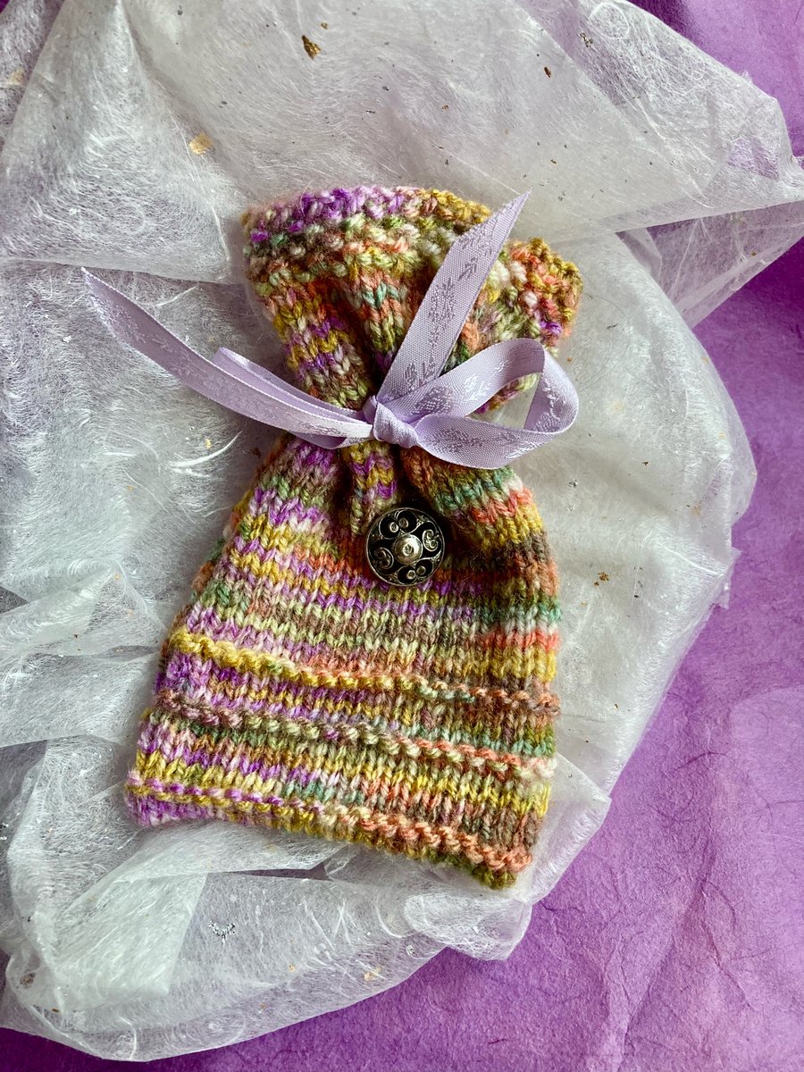 Unique knitted gift bag with lilac ribbon