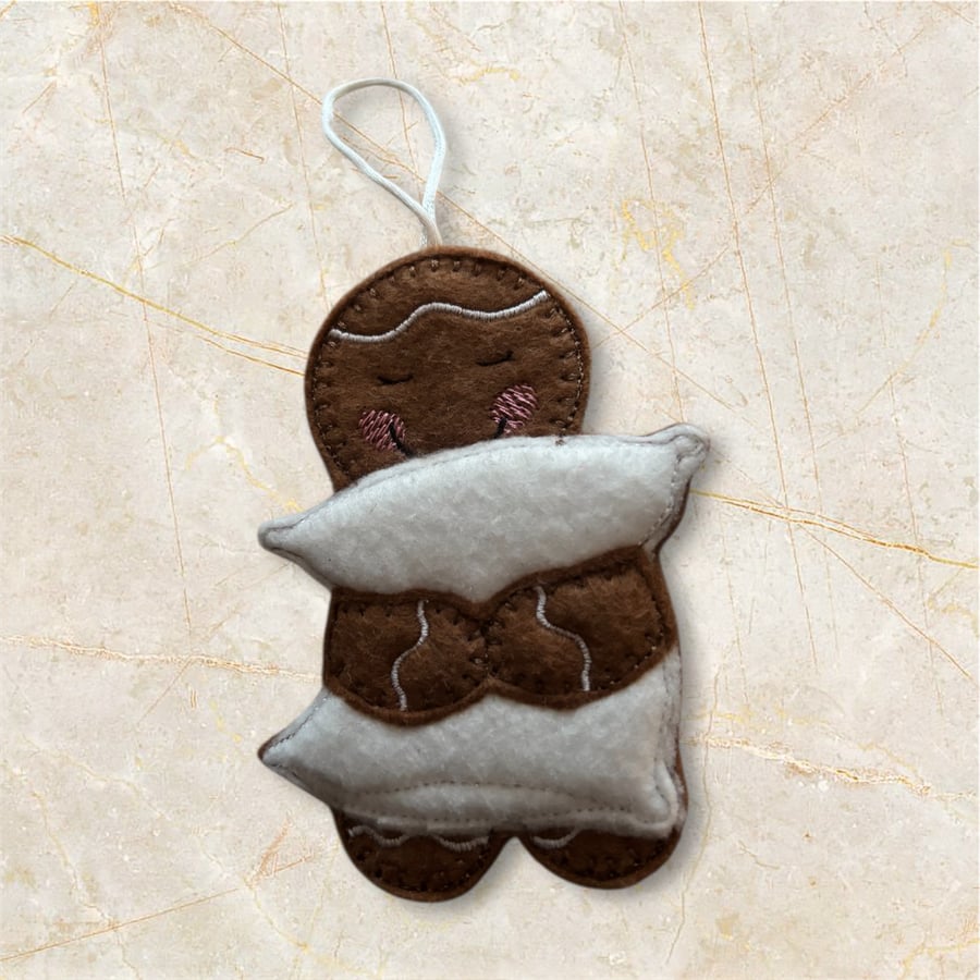 Gingerbread cuddling a pillow Embroidered Hanging Keepsake 