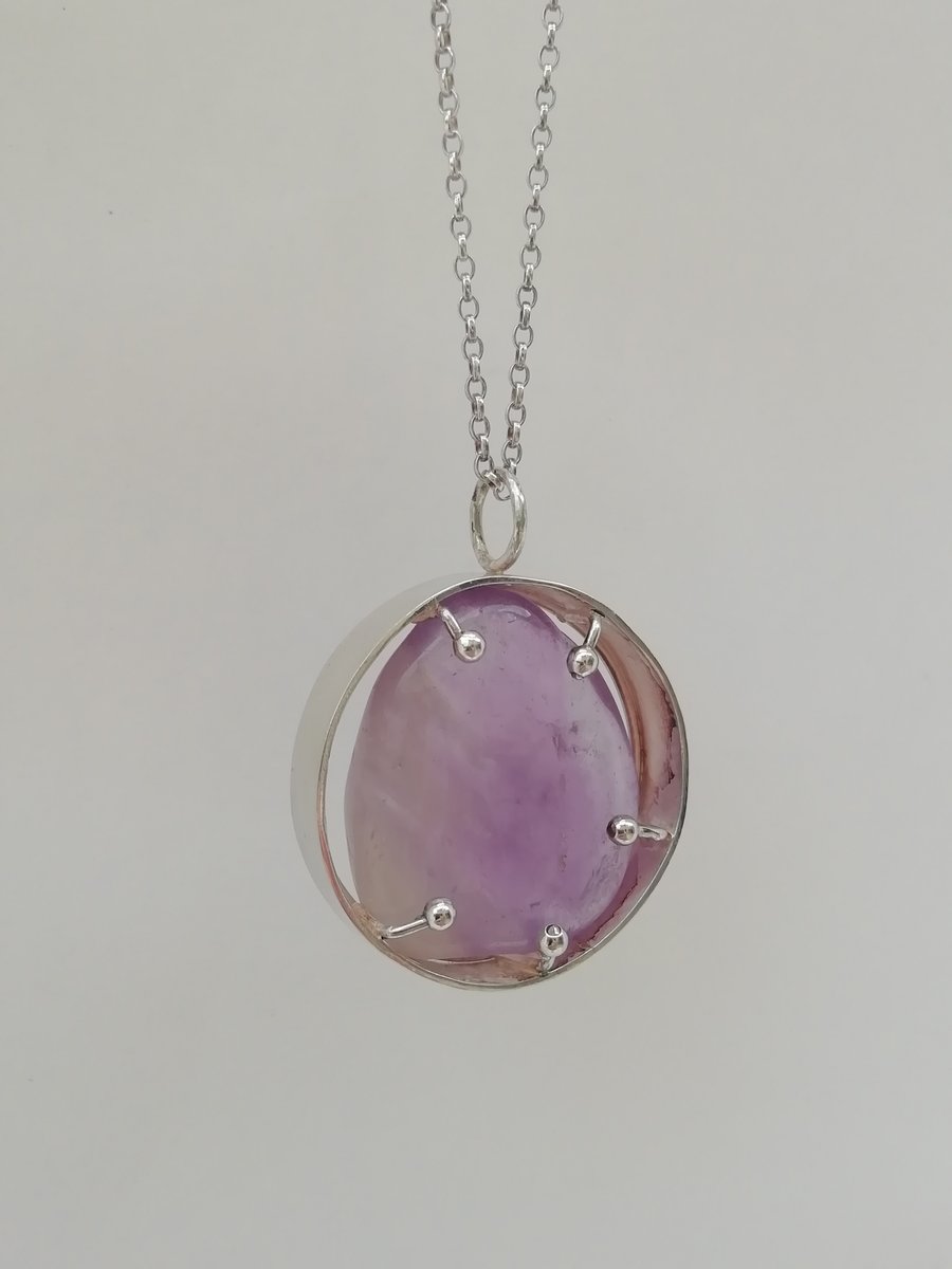 Large Amethyst in a Silver Ball and Ring Pendant