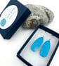 Turquoise anodised aluminium ammonite drop earrings - Image 4