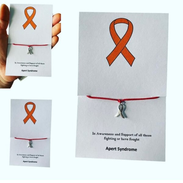 Apert syndrome wish bracelet red ribbon charm corded wish bracelet 