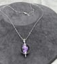 purple and clear swirly glass ball shaped lampwork glass pendant necklace