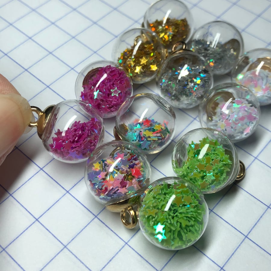 12 star filled glass bauble pendants floral colours