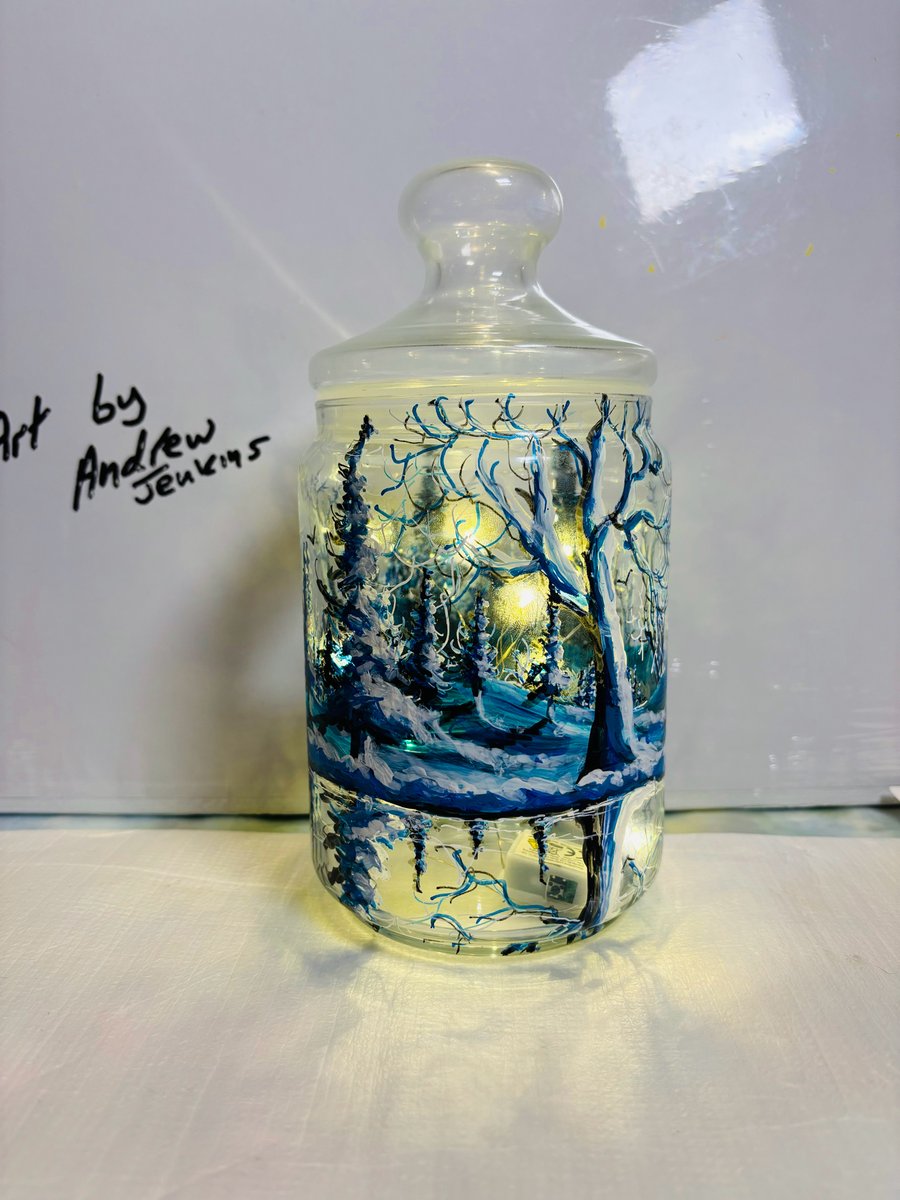 A hand painted and fired glass jar with sealable lid by Andrew Jenkins 