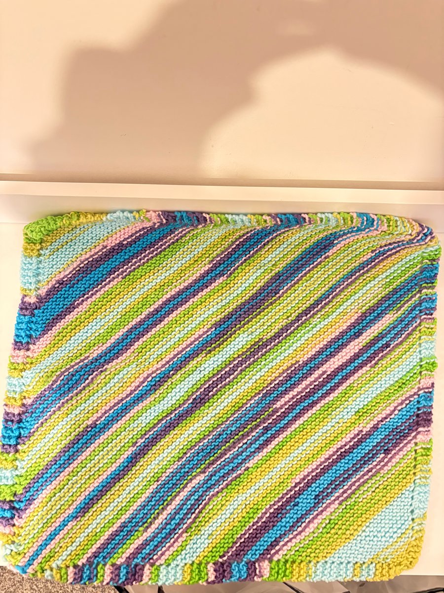 Hand knitted baby blanket. 