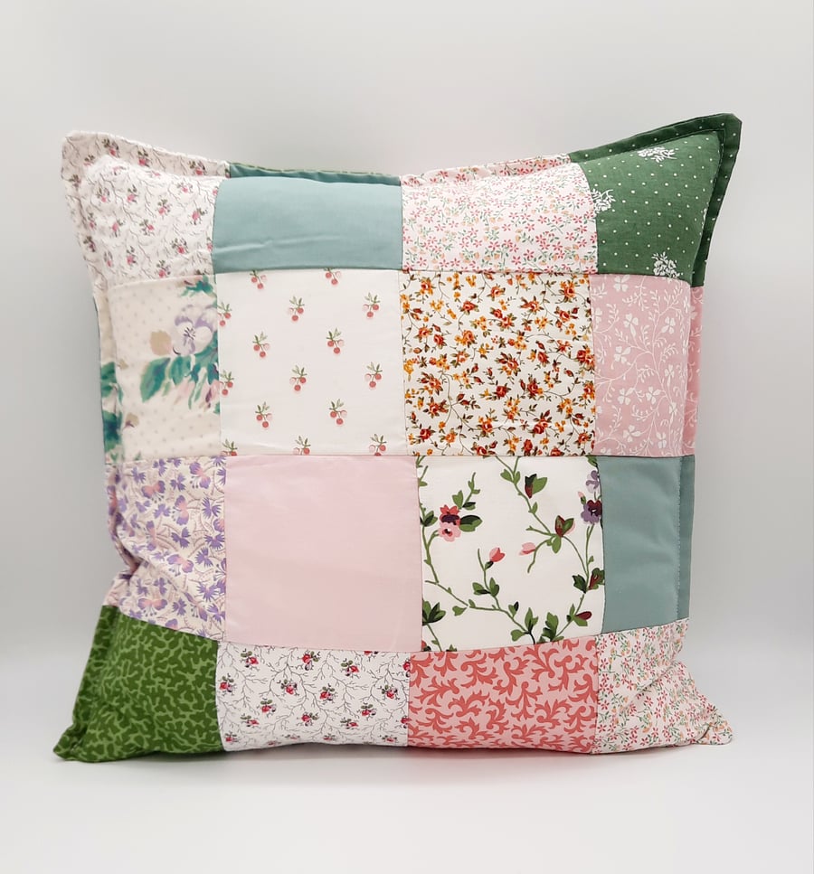 Patchwork cushion cover with zip. Pink and green theme.  