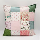 Patchwork cushion cover with zip. Pink and green theme.  