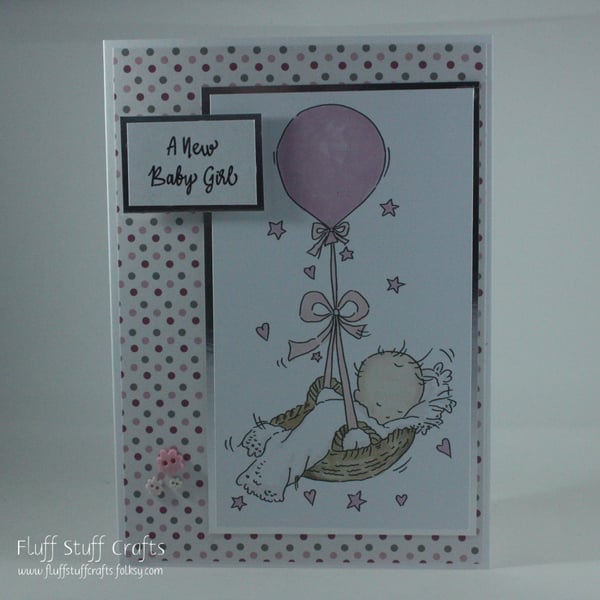 New baby girl card -  baby in balloon basket