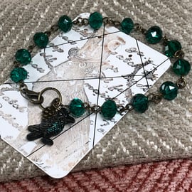 Emerald green crystal raven bracelet