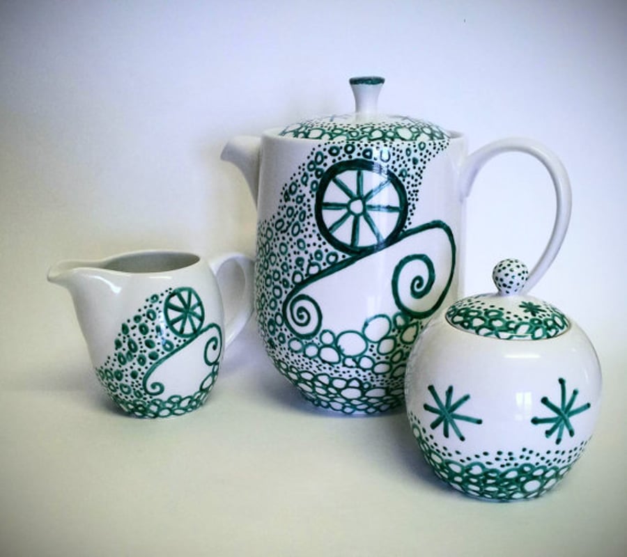 Hand decorated porcelain tea  or coffee set.