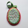 Decoration -  Hanging oval - green ribbon.