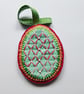 Decoration -  Hanging oval - green ribbon.