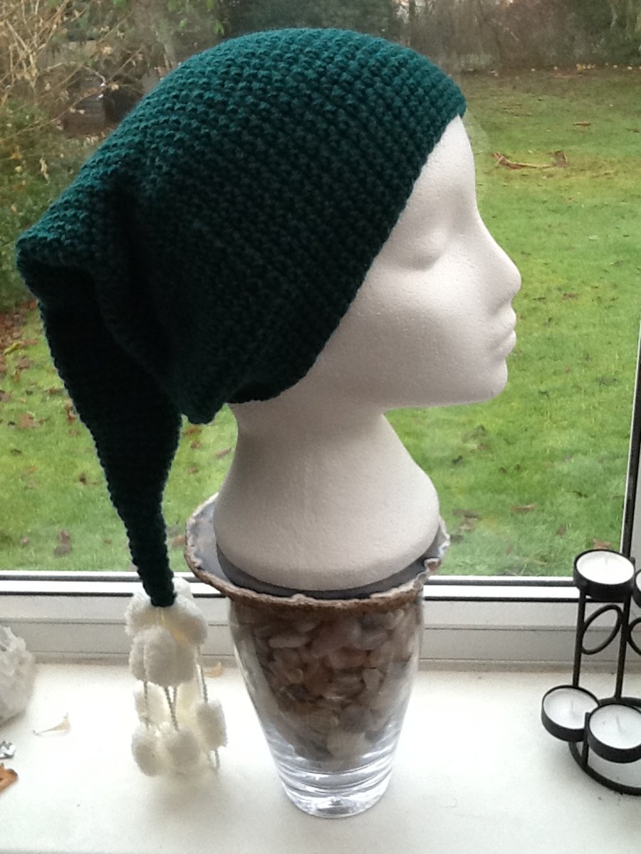 Deep Green Elf Style Hat with Pom Pom looping Tassel detailing.