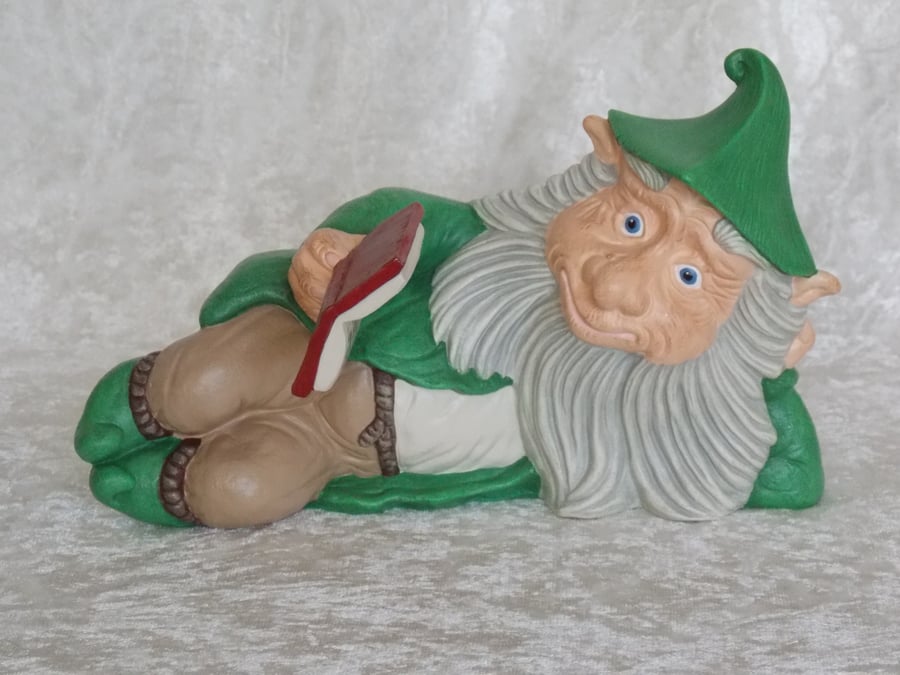 Hand Painted Ceramic Lying Down Garden Gnome In Green & Book Figurine Ornament.