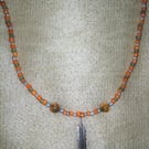 Feather of Maat and Crystal Orange and Silver Beaded Necklace