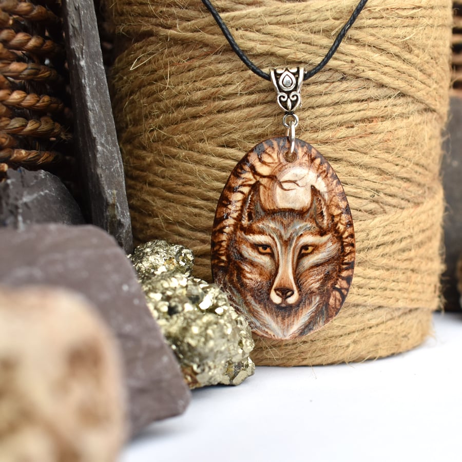 She wolf in the forest. Pyrography wooden pendant necklace.