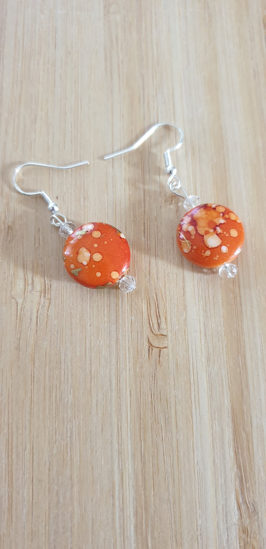 Orange round earrings