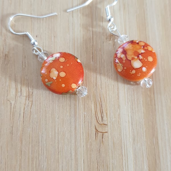 Orange round earrings