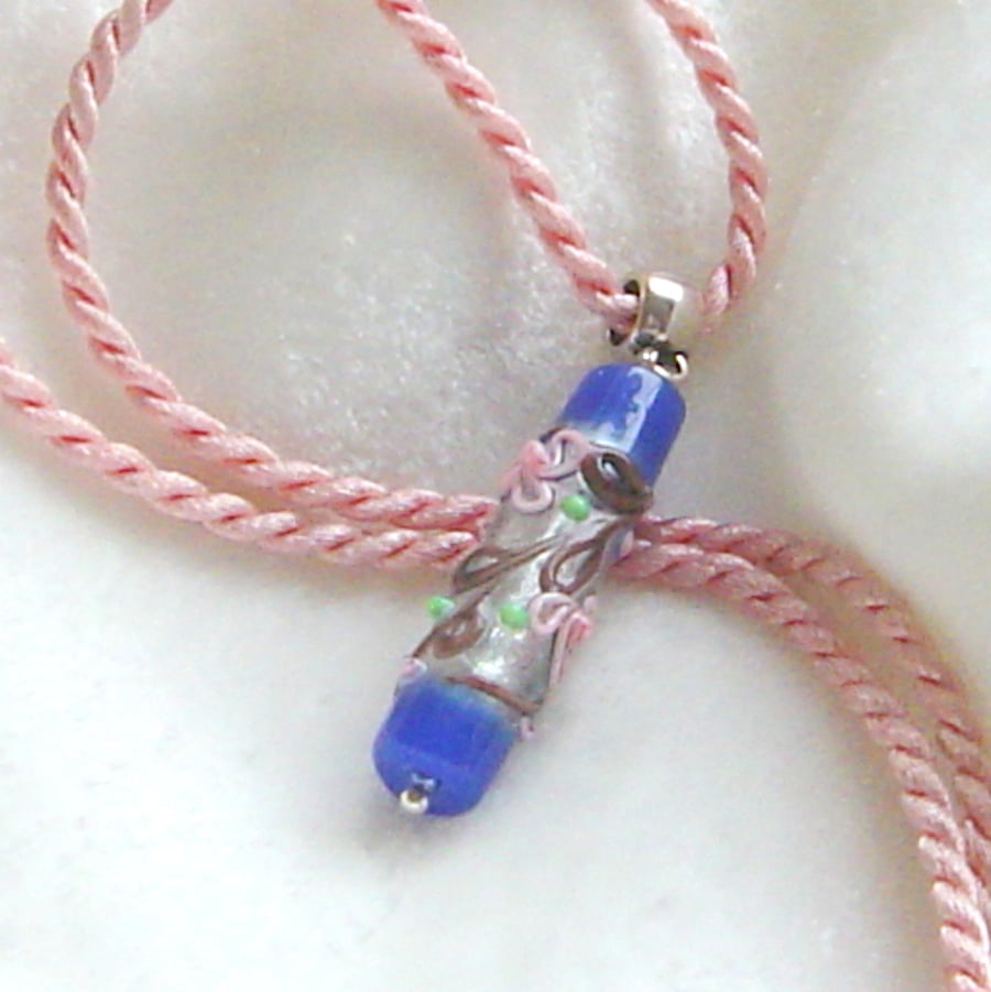 Lampwork glass bead on silky cord pendant Woodland blue