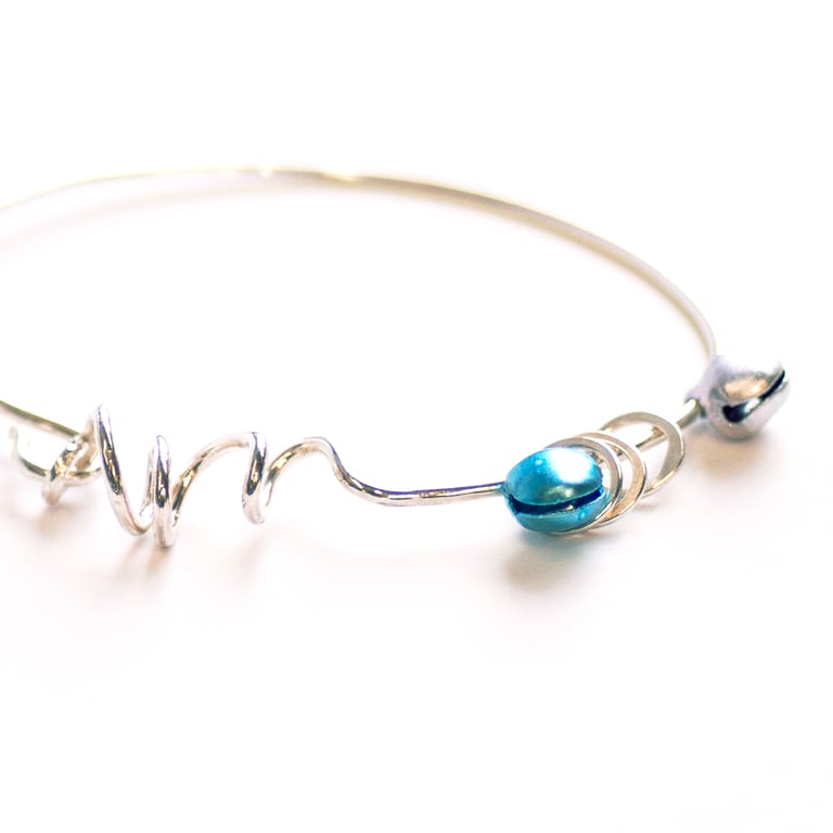 Sterling Silver Twisted Bangle with Hoops and Tiny Bells 