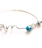 Sterling Silver Twisted Bangle with Hoops and Tiny Bells 