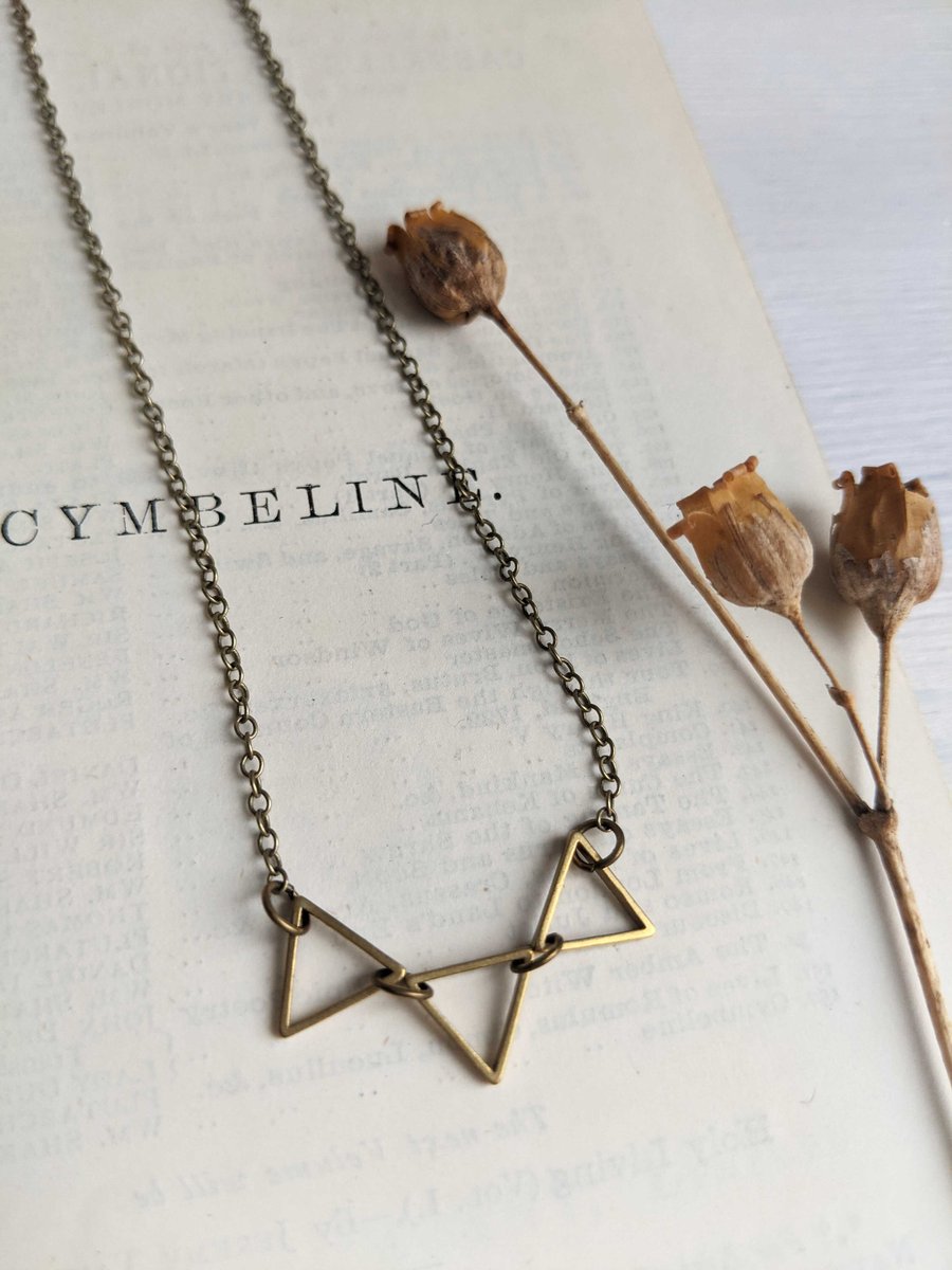 Golden Triangles charm necklace - petite triangles in a row - geometric