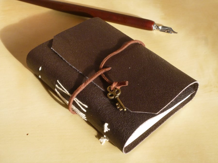 Leather bound wrap-front notebook - sketchbook - journal with key