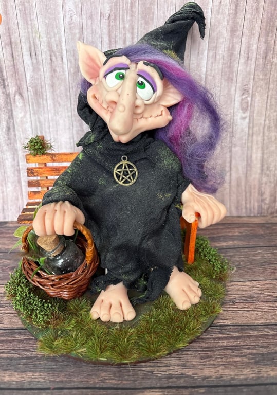 Witch on a Bench Figurine - Purple and black, with her witchy basket!