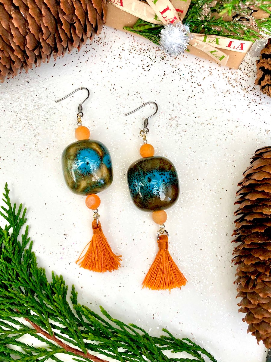 Beautiful Ceramic long drop Earrings with citrine stones and tassels.