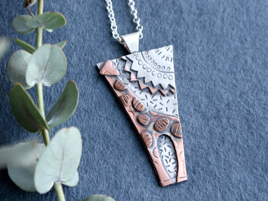 Geometric giraff  and sun pendant