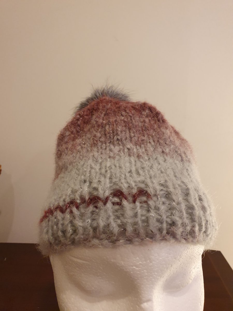 Pull on handknitted hat.