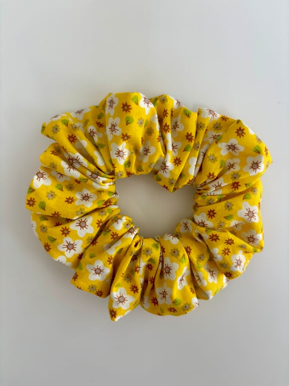 Cotton scrunchie hair accessory in a yellow and white fun print