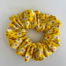 Cotton scrunchie hair accessory in a yellow and white fun print