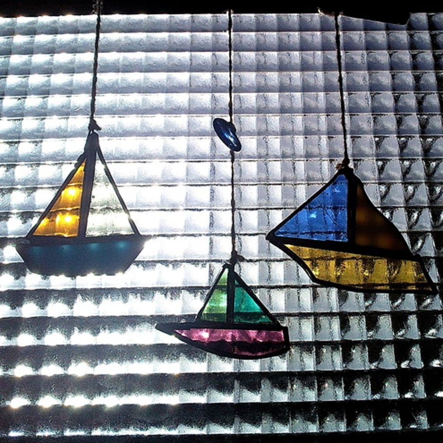 Stained glass and driftwood boat mobile with blue glass bead