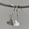 Pretty, pure silver heart earrings with lovely bubbles texture. 