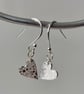 Pretty, pure silver heart earrings with lovely bubbles texture. 