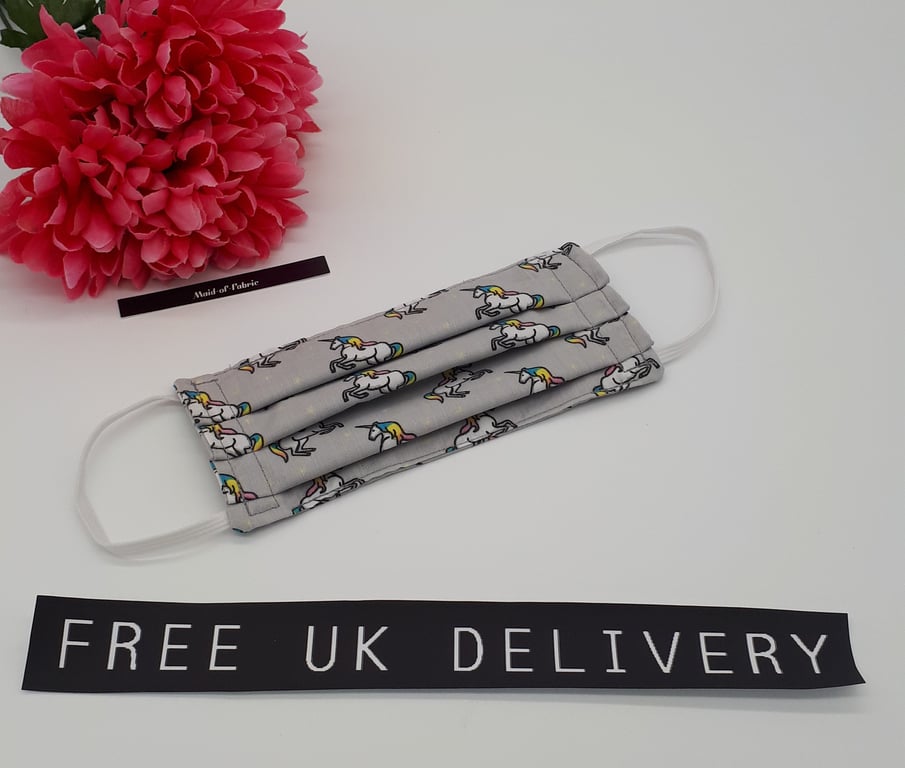 Face mask,  small, 3 layer,  machine washable in grey unicorn fabric.  