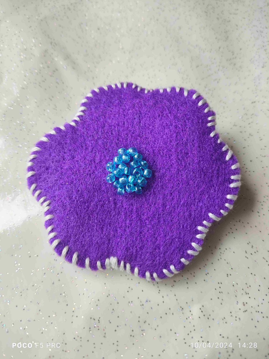 Purple felt flower brooch