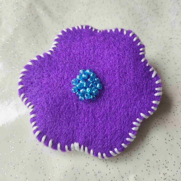 Purple felt flower brooch