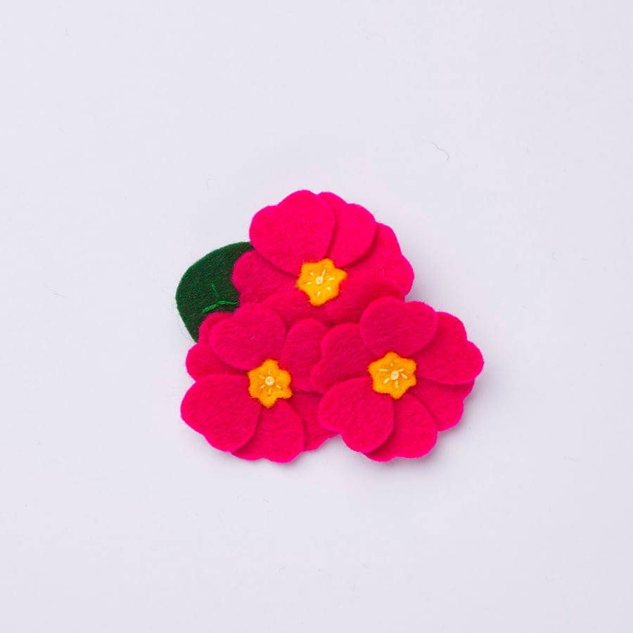 bright pink primrose flower brooch