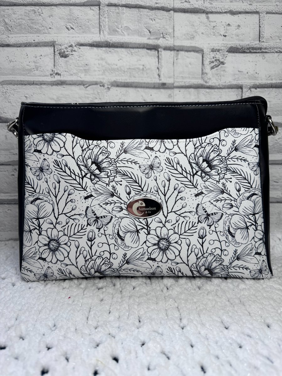 Medium crossbody bag in Black & White faux leather  with multiple pockets