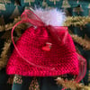 Dark shimmer pink Christmas knitted gift bag