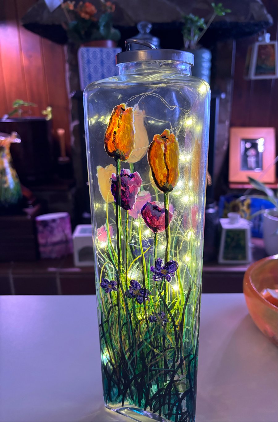 A hand painted and fired spring glass vase by Andrew Jenkins 