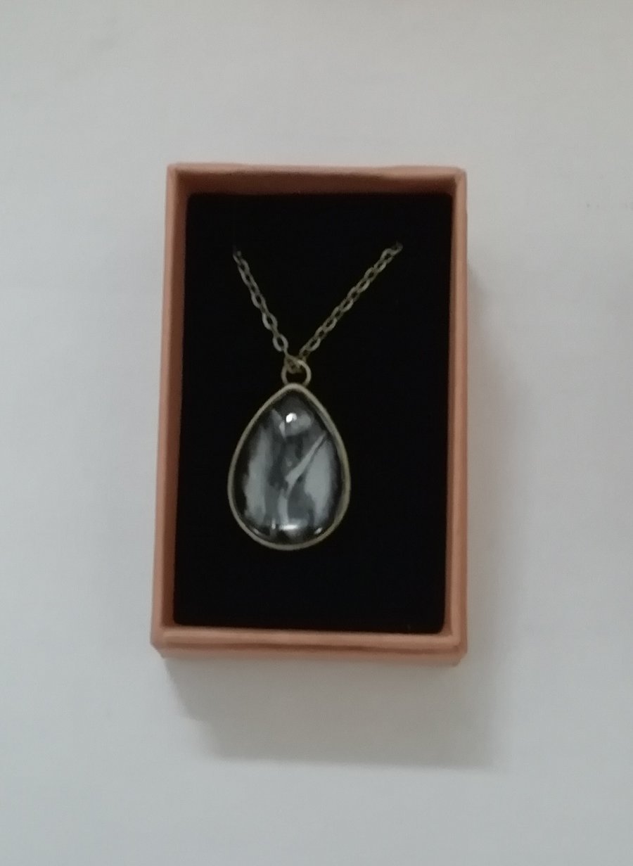 Marble clay glass costume jewellery pendant with a bronze metal chain   