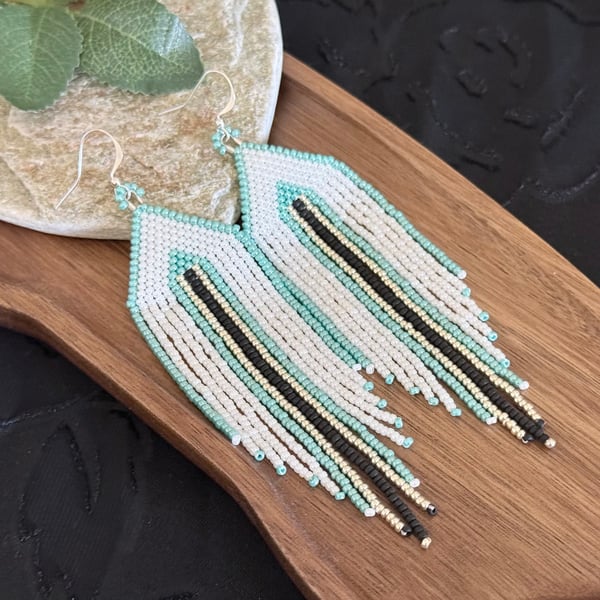 Long turquoise and white Southwestern style beaded fringe earrings 