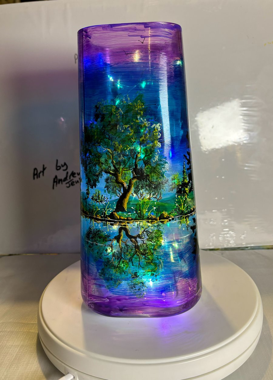 A hand painted and fired glass vase by Andrew Jenkins 