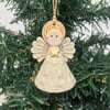 Teeny little ceramic angel Christmas angel Gold Star