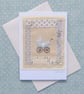 Little pram embroidered card to welcome a new baby, silk bow and mop button