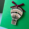 Blank card with detachable wooden 'Anniversary wishes' balloon decoration
