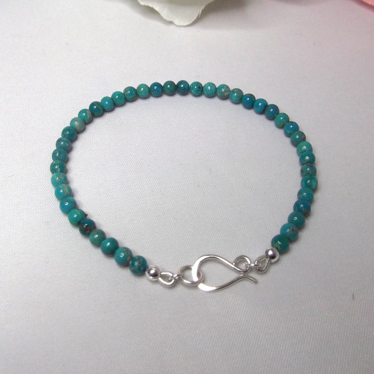 Turquoise bracelet of small round beads with recycled sterling silver clasp